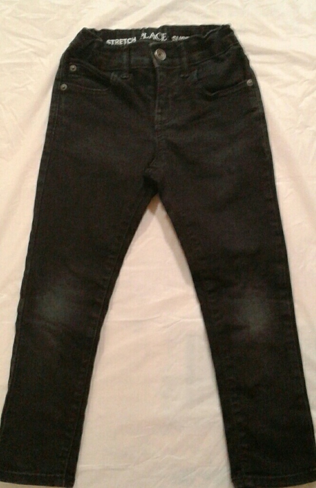 Children place black jeans